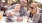 family at table outside
