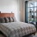 open bedroom with large window